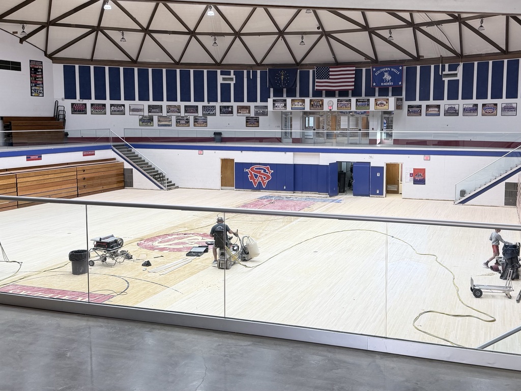 Gym floor being sanded down and prepared for an updated design!