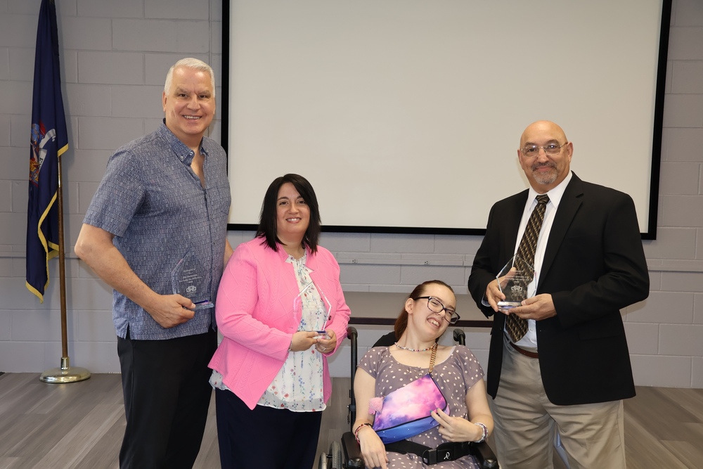 Honorees pose with their awards as community partners