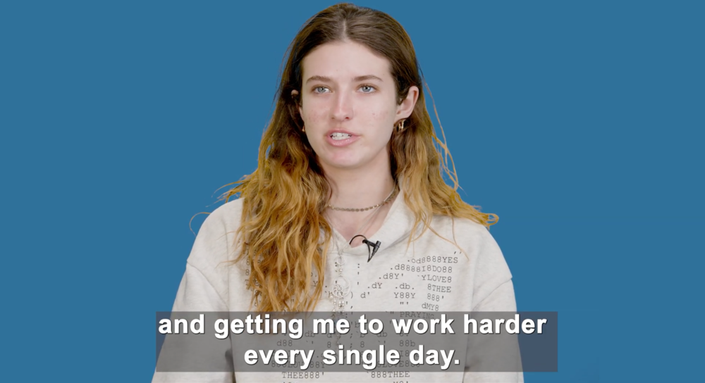 still frame from student video interview with subtitle