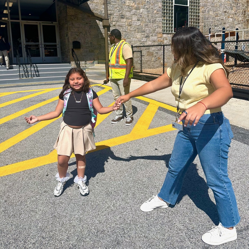 student and teacher on first day of school