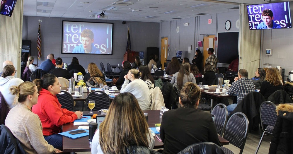 counselors attend networking breakfast