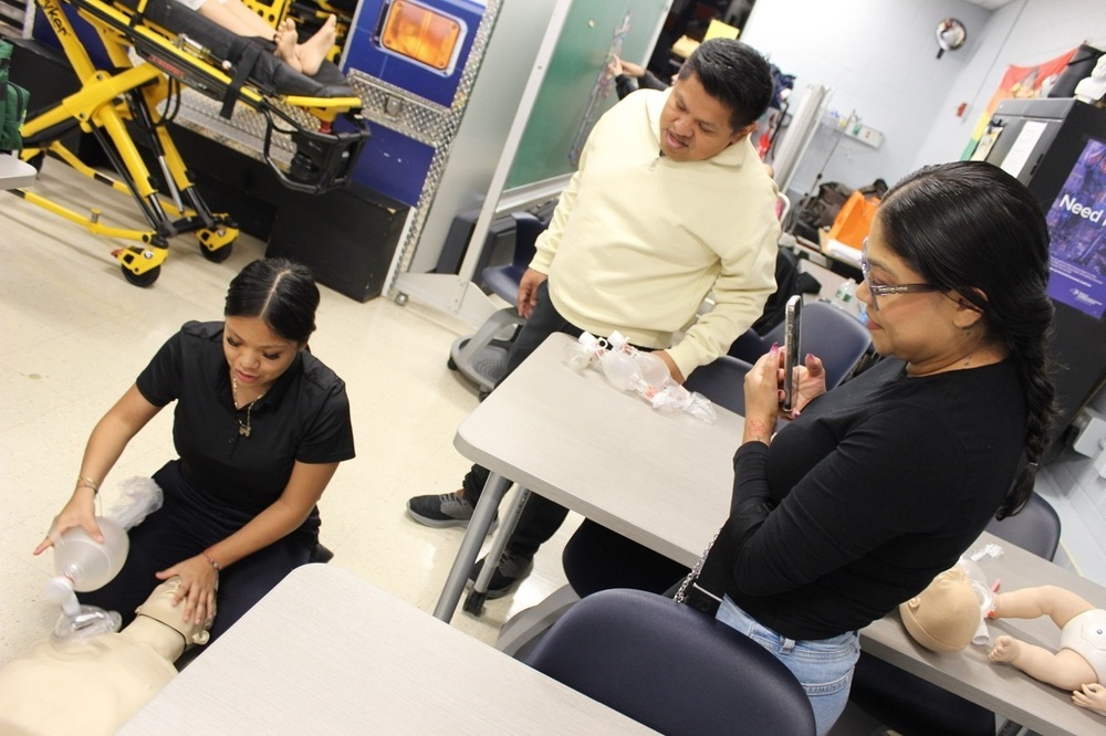 An EMS student demonstrates her skills during Open House on Oct. 8, 2026.