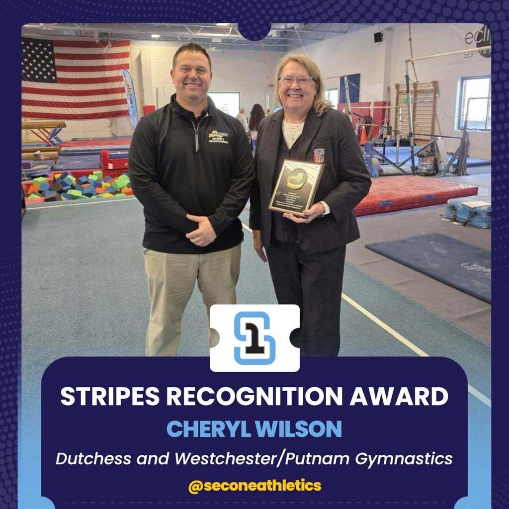 todd and cheryl holding award
