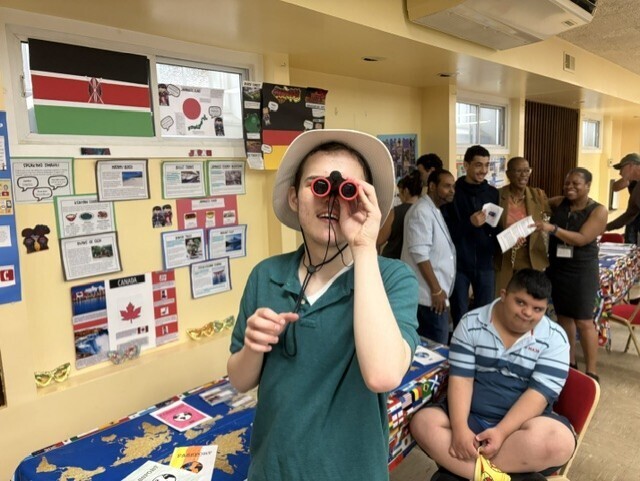 Student with binoculars