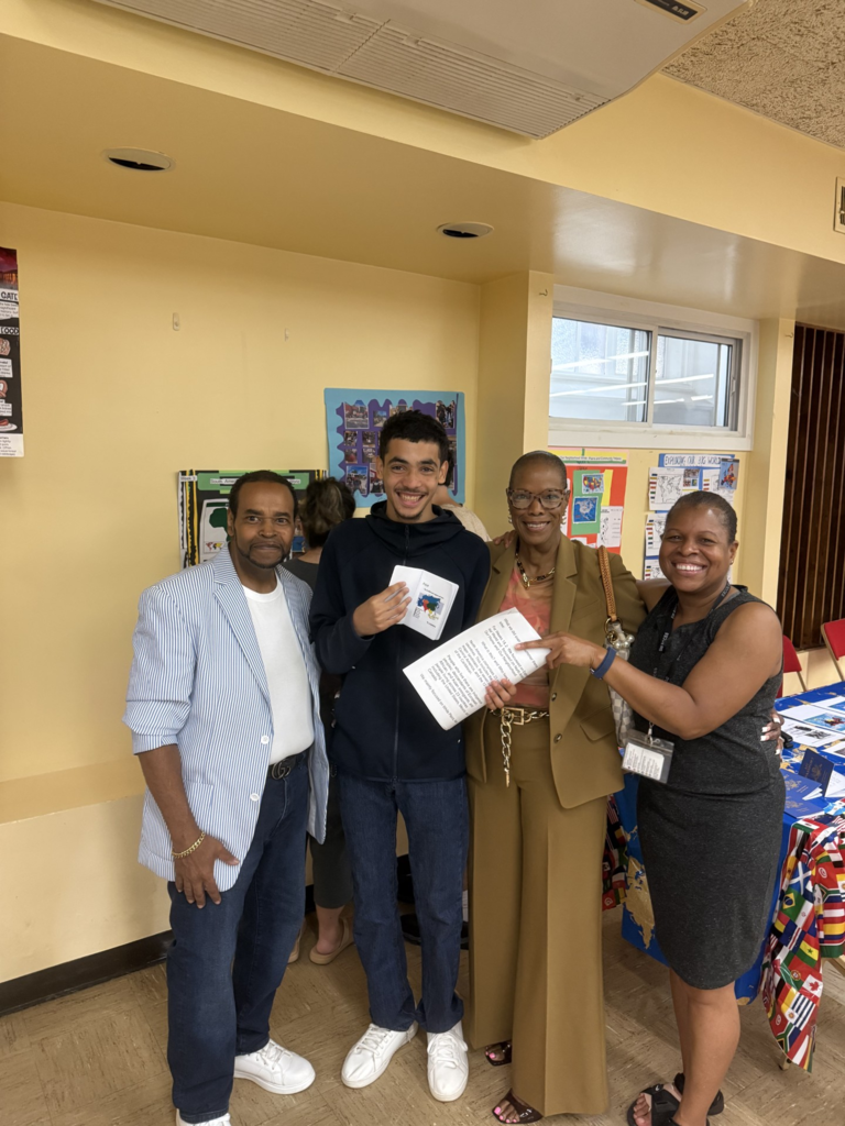 Student with parents and teacher
