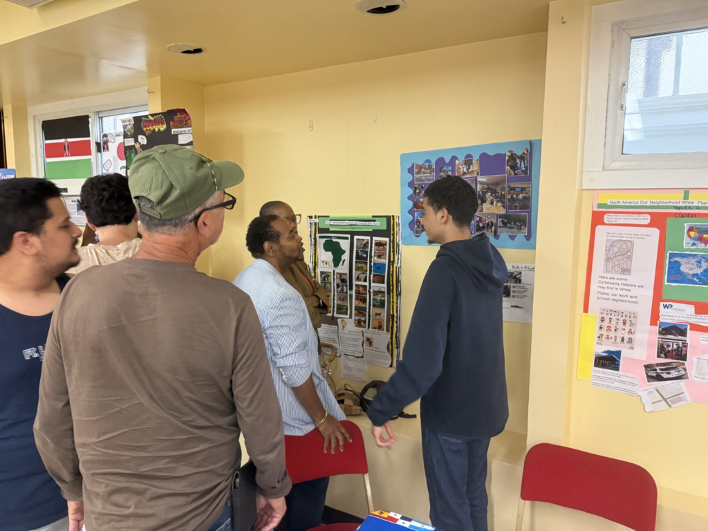 Student showing various projects done over the summer