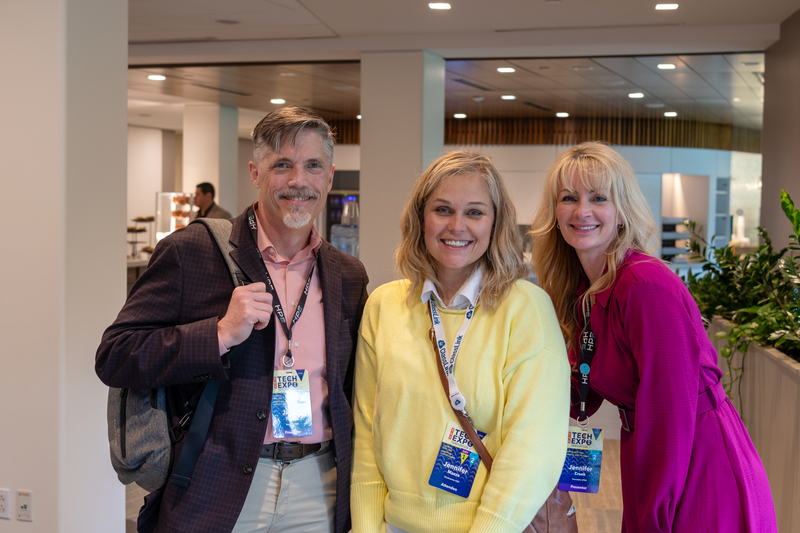 A group of district leaders pose together during the conference