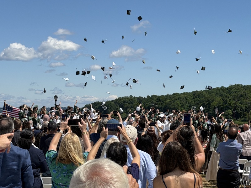 caps thrown in the air at graduation