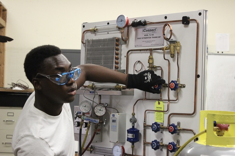 HVAC students learned how to service air conditioning units.