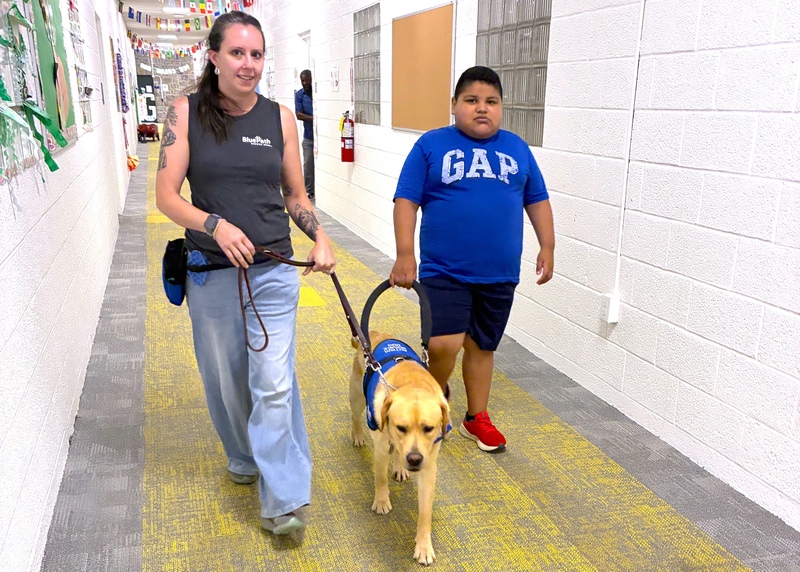 Bluepath Therapy Dog visit Transfiguration students and staff