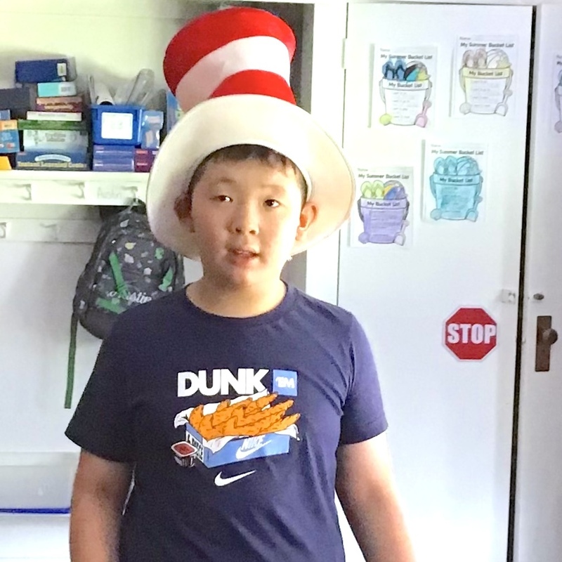 Boy in Cat in the Hat hat