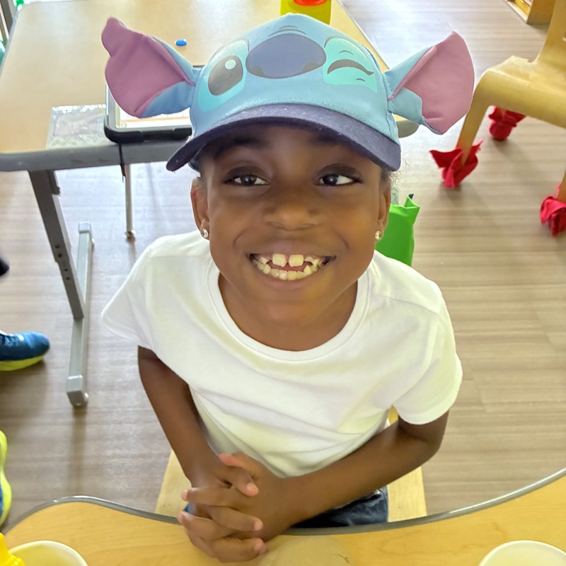 Boy wearing Lilo and Stitch hat