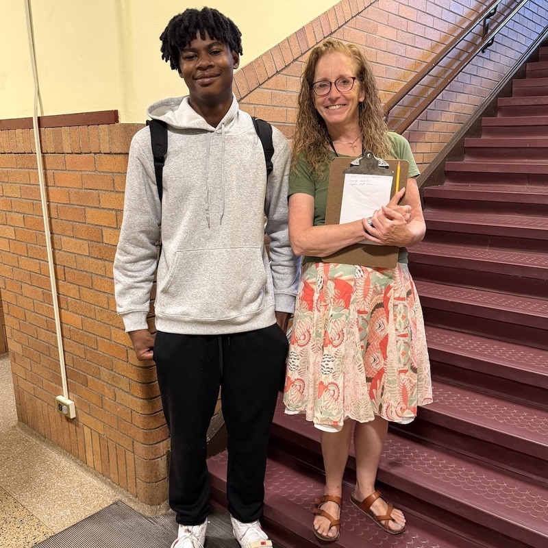 teacher and student by stairs