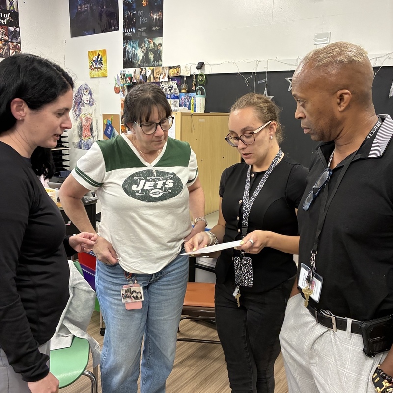 teachers discuss program details