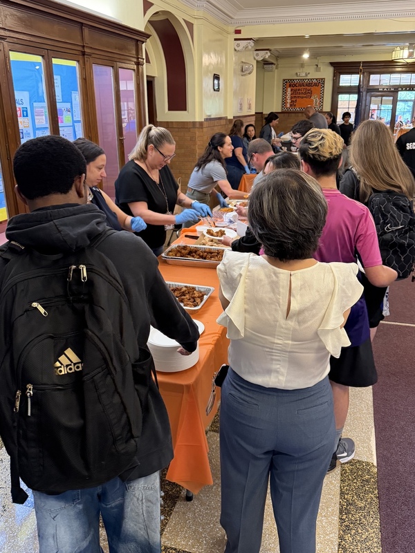 families enjoy buffet lunch in lobby