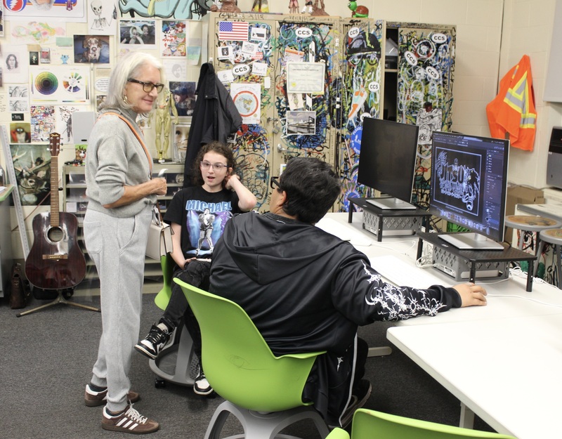 Advertising & Graphic Design students display projects.