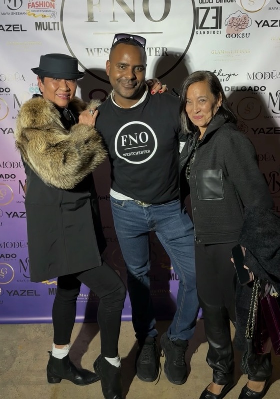 Juan Delgado (center) is a former Center for Career Services student.