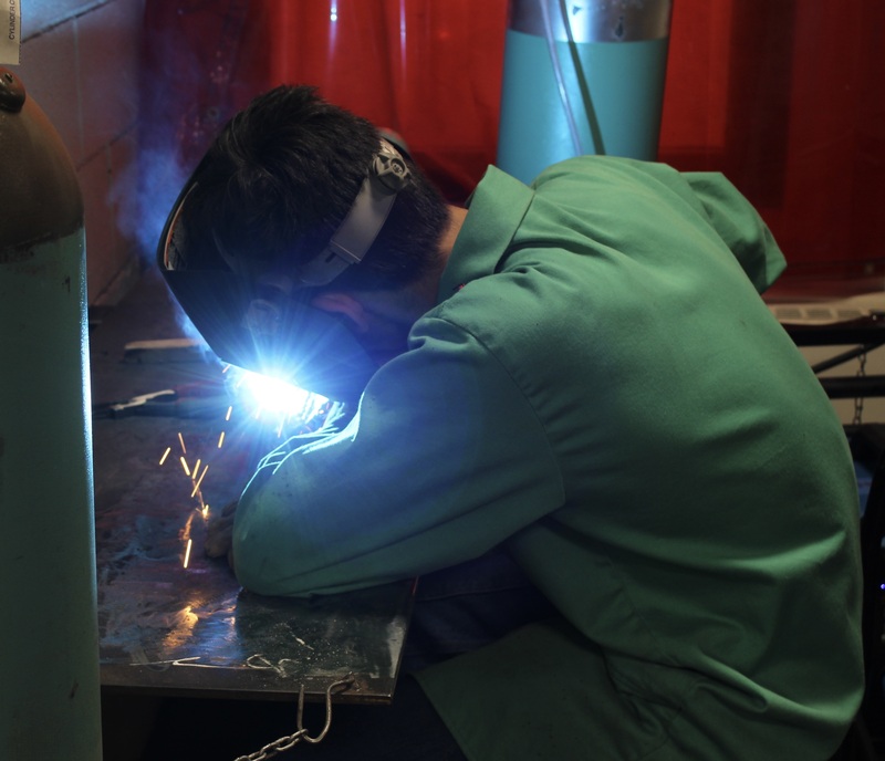 A student in the Welding program works on a project.