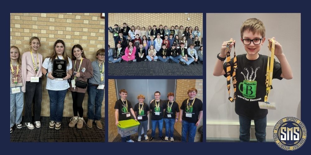 students showing awards