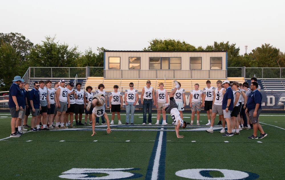 HS Football Team 2 players  backflip