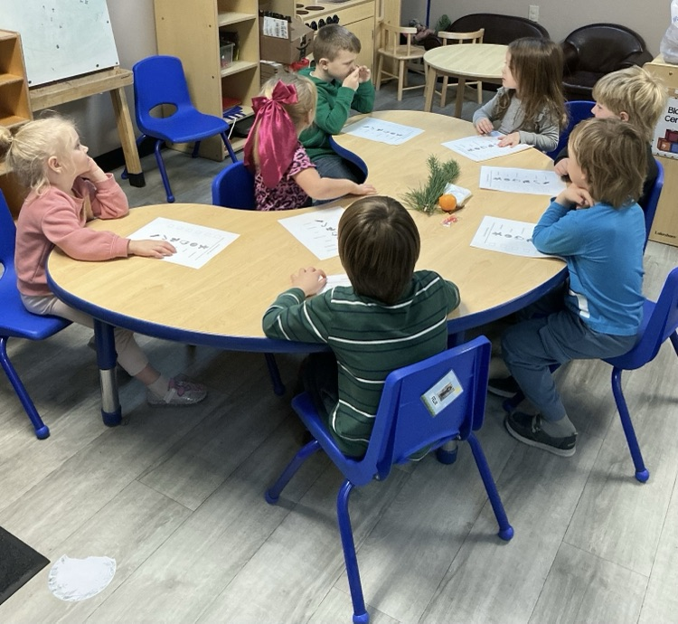 children sitting at table