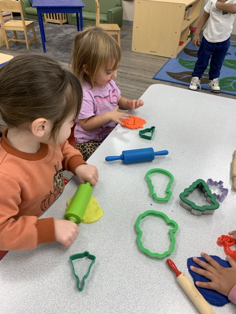 children playing with playdoh