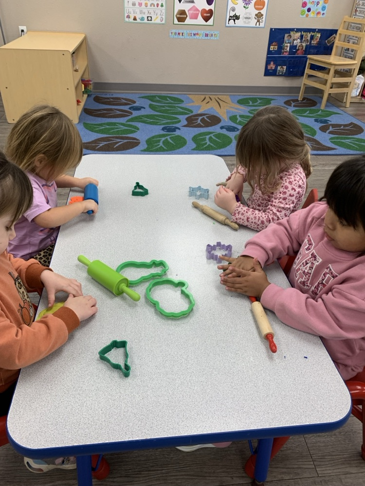 children playing with playdoh