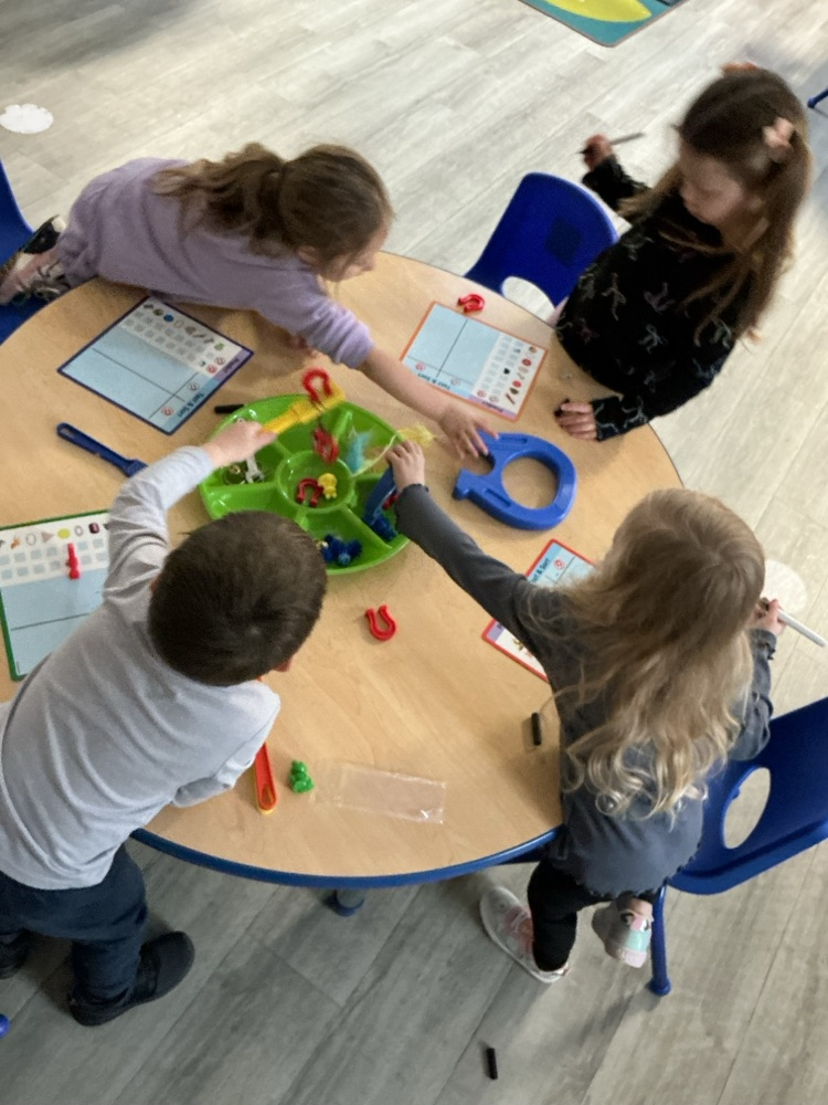 children exploring magnets