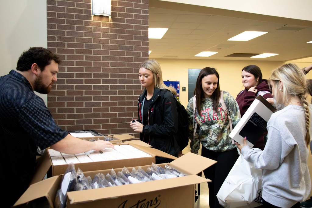Seniors in line for cap and gowns