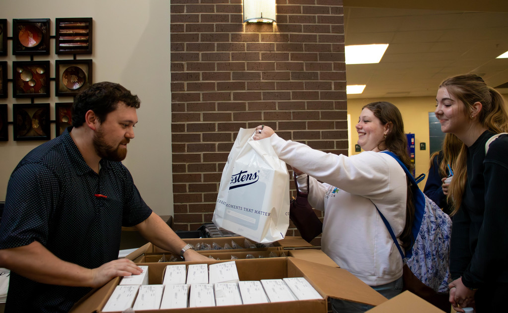 Man and two senior girls 