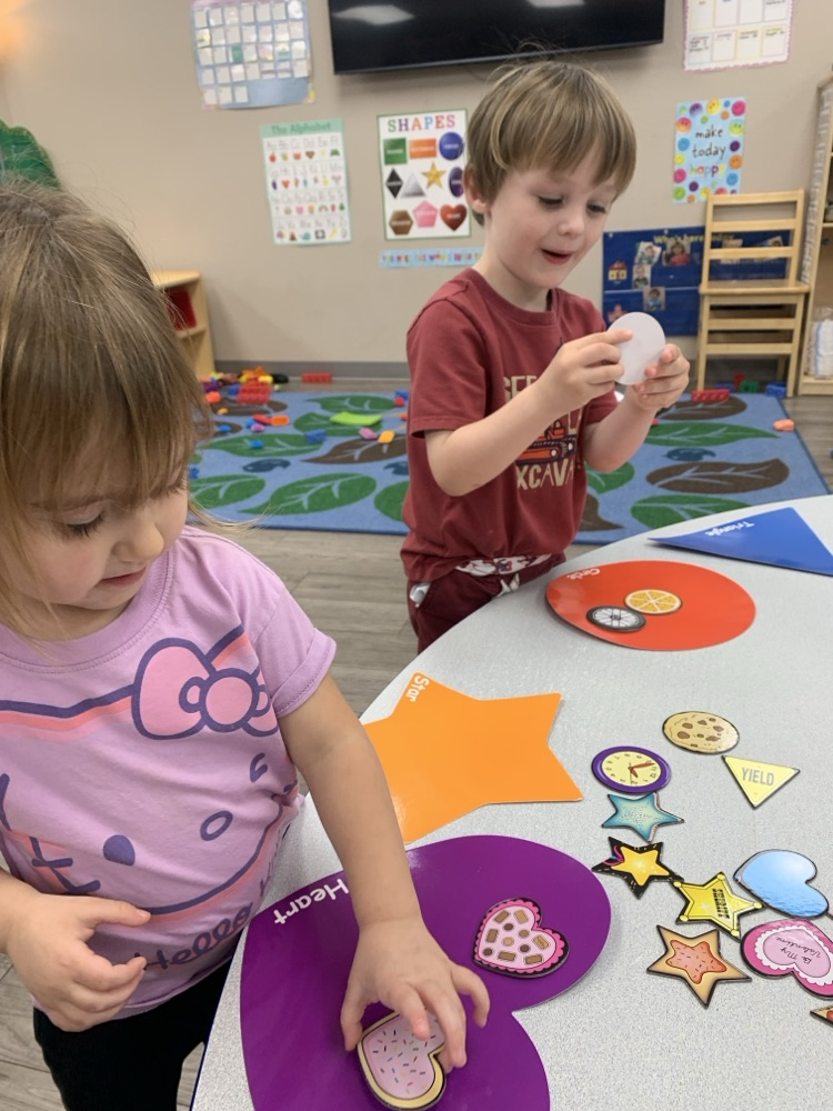 children sorting shapes