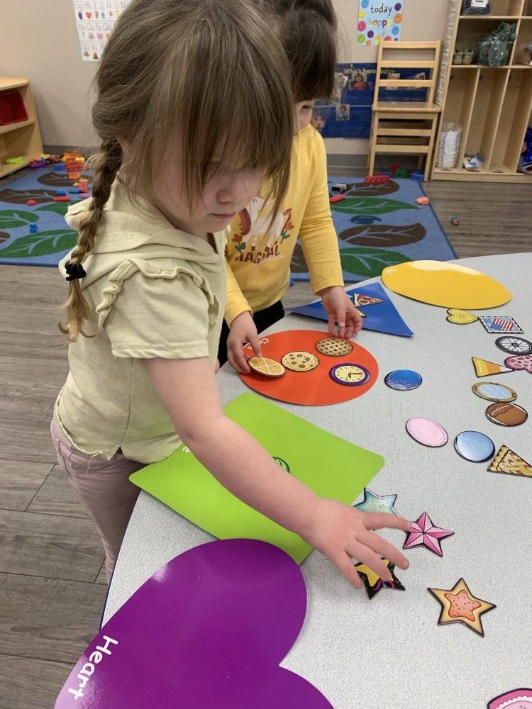 children sorting shapes