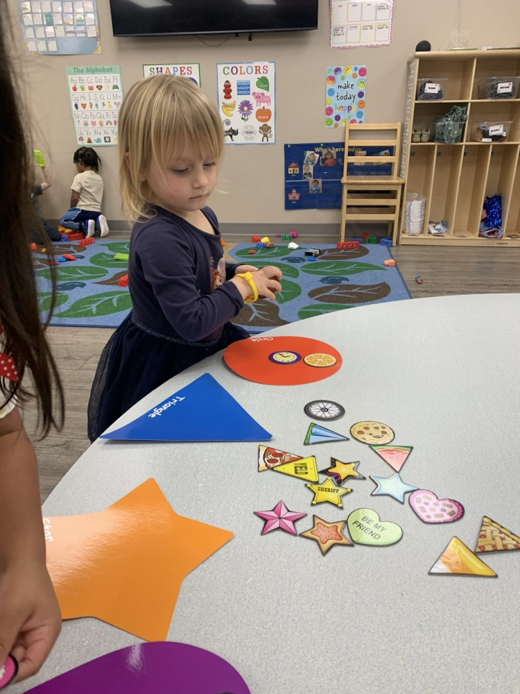 children sorting shapes