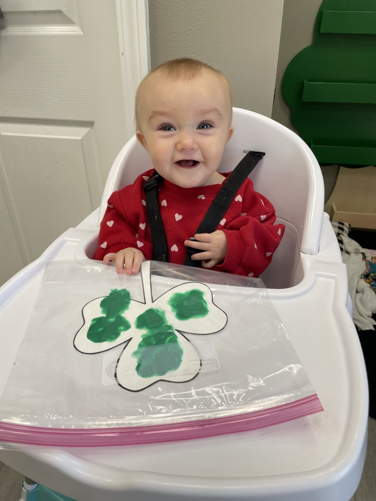 baby doing sensory play