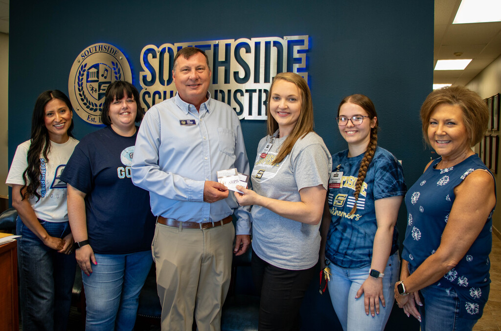 group man women receiving donation