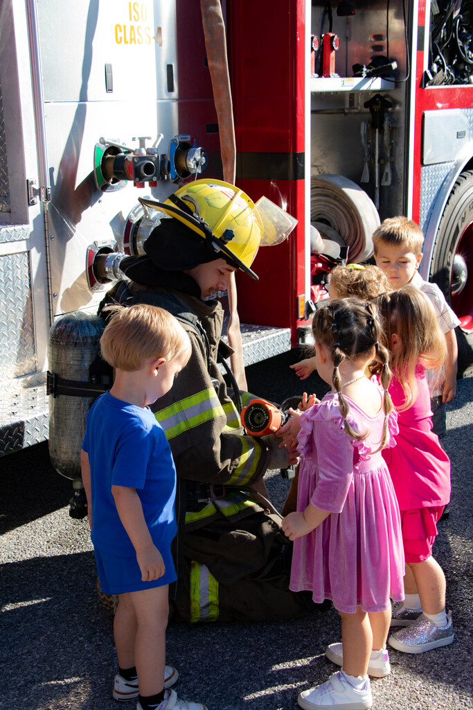 preschoolers with fire fighters