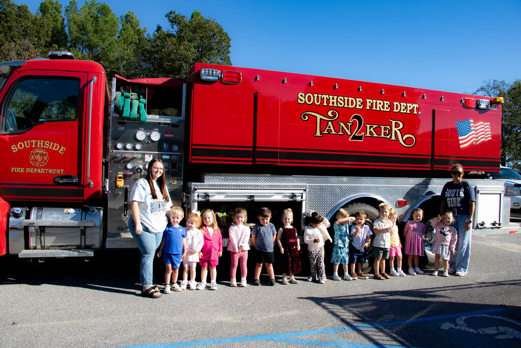 preschoolers with fire fighters