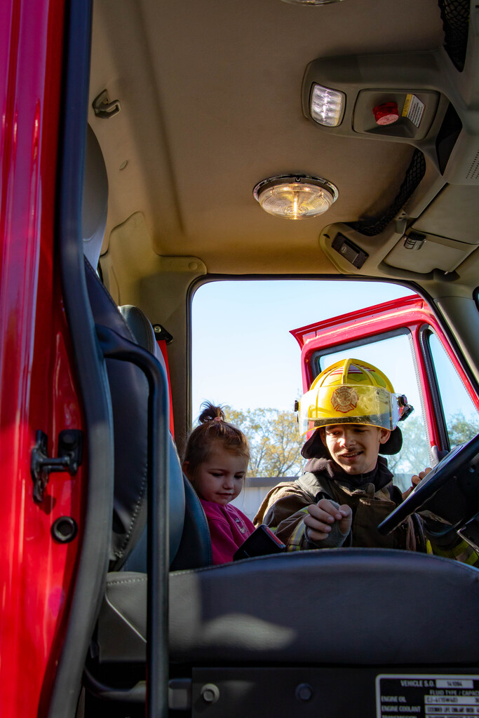 preschoolers with fire fighters