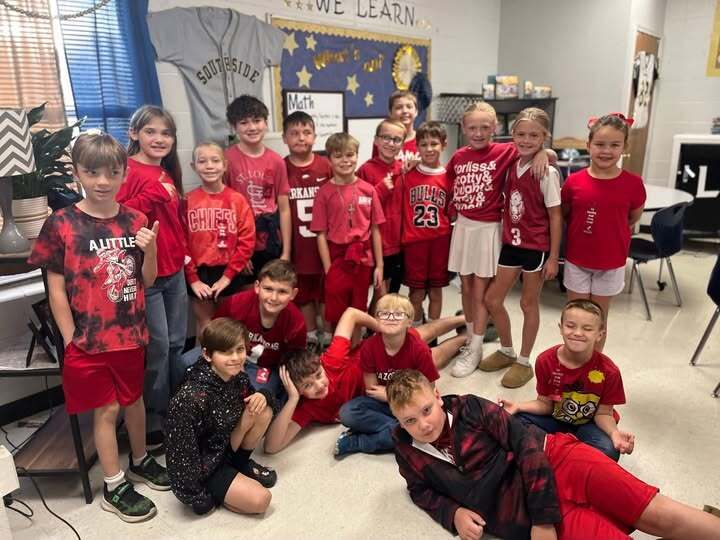 students wearing red