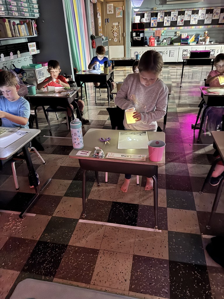 Mrs. Kline's first graders lit up science class making star projectors! They discovered why stars twinkle at night but hide during the day. The lesson ended with an impromptu disco dance party. 