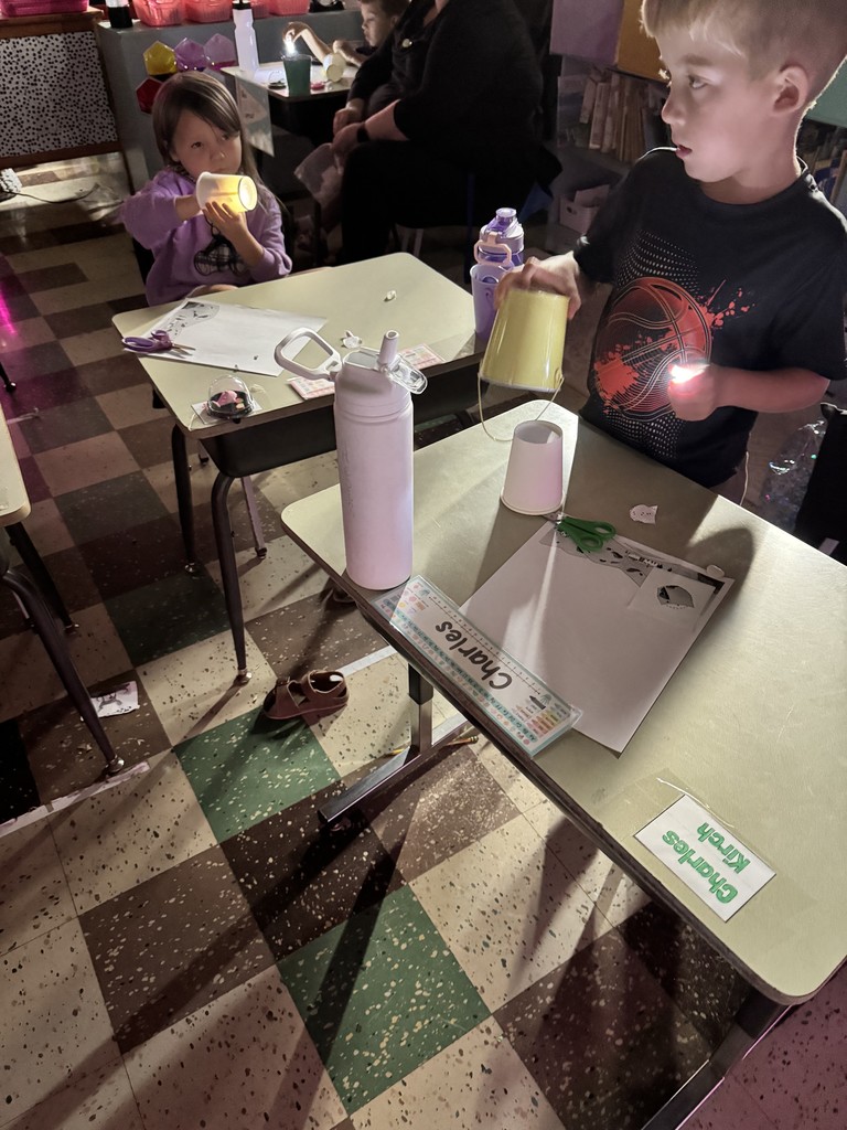 Mrs. Kline's first graders lit up science class making star projectors! They discovered why stars twinkle at night but hide during the day. The lesson ended with an impromptu disco dance party. 