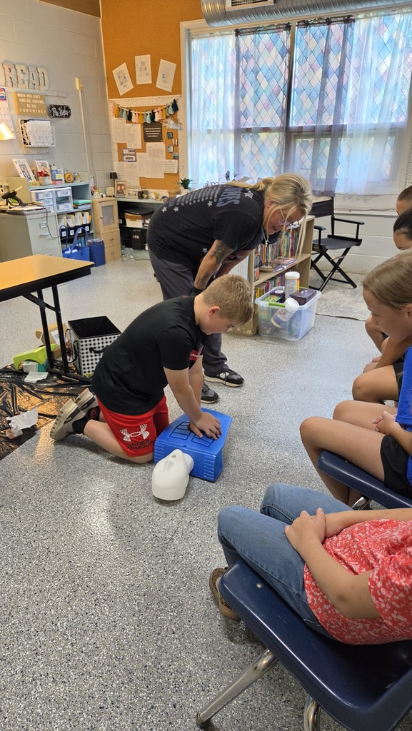 Peyton performing CPR!