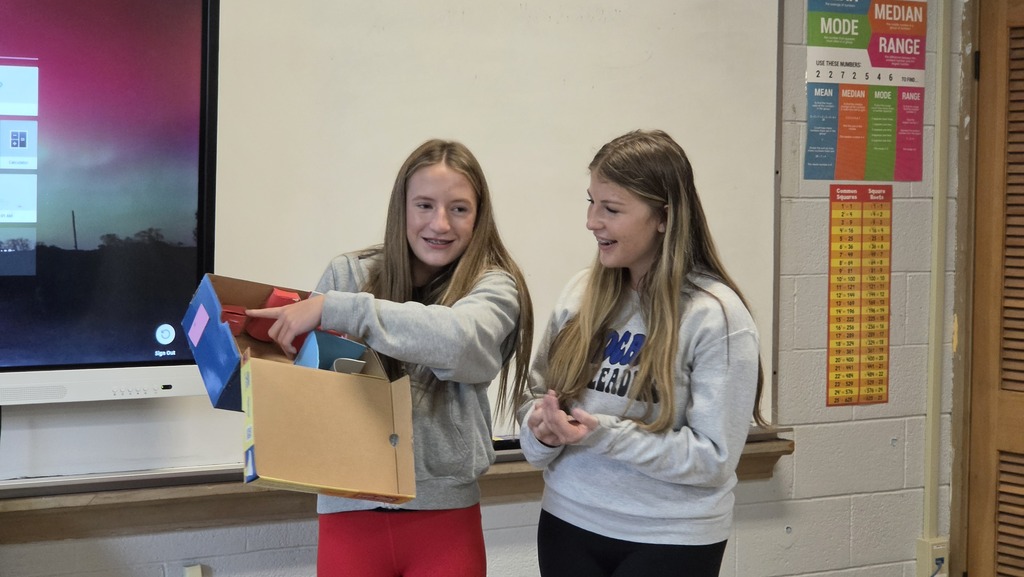 Briley and McKinley showing off their tiny-house!
