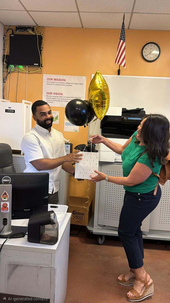 Mr. Wells receiving his gift