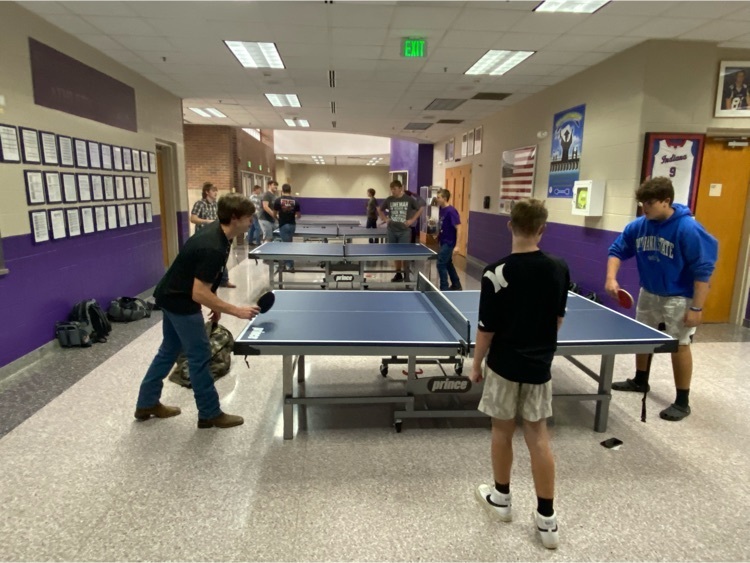 students playing ping pong