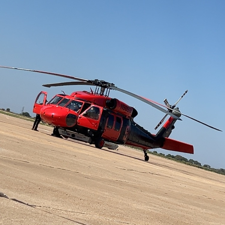 Blackhawk getting preflight checks done before takeoff