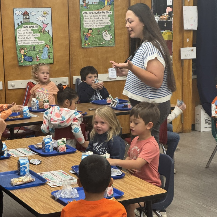 Kaitlen with students