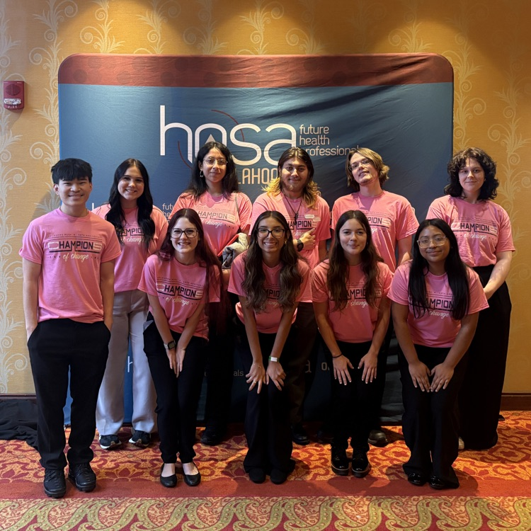ten people in pink shirts