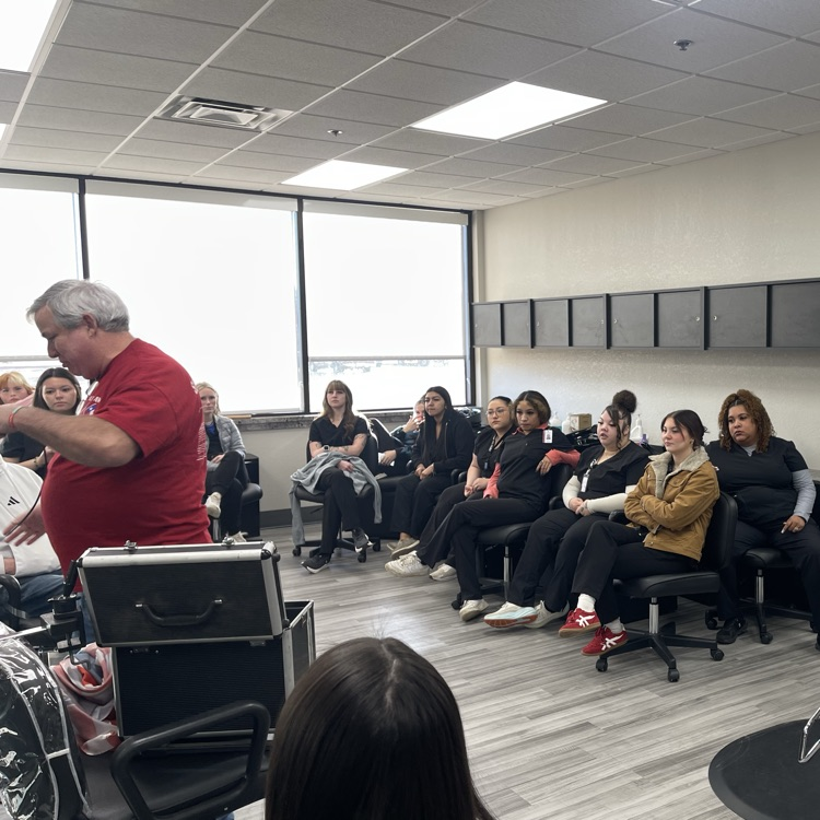 guest stylist teaching men’s cut