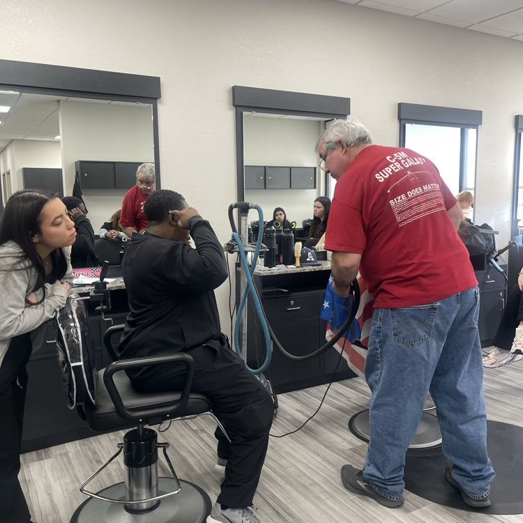 guest stylist teaching men’s cut